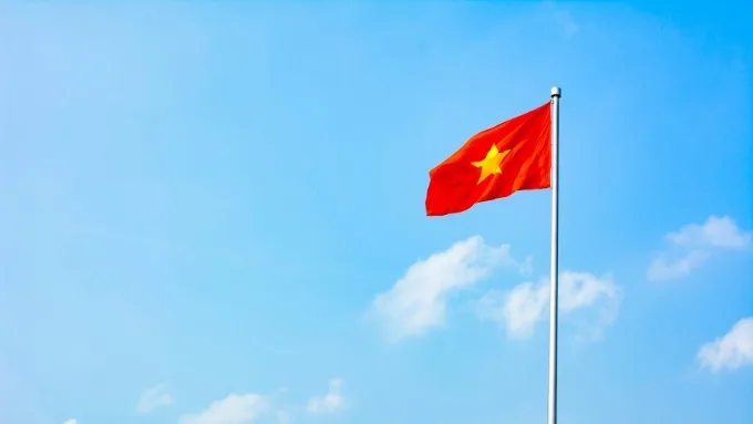 Hình nền lá cờ Việt Nam trên nền trời xanh